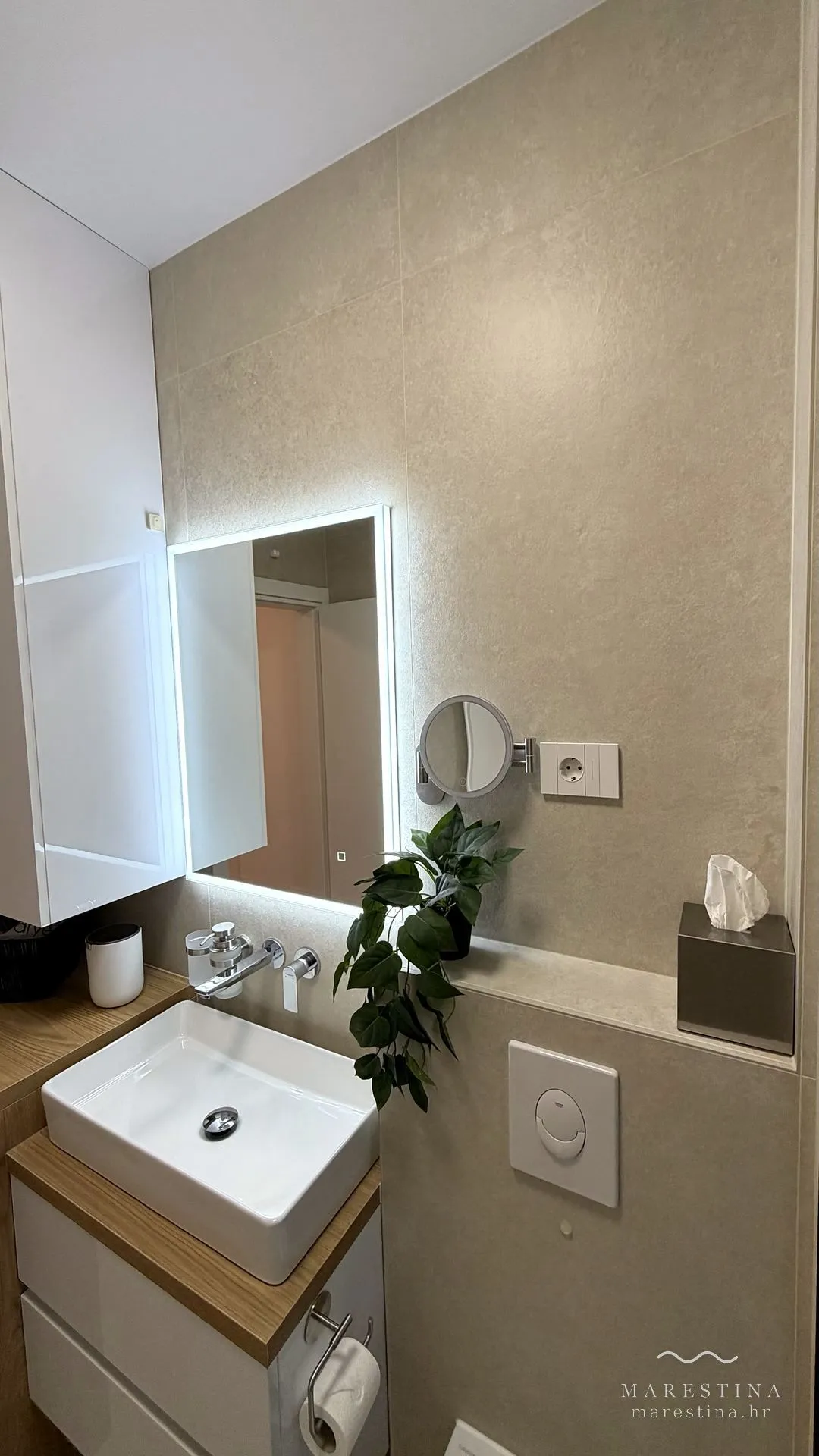 Second bathroom with walk-in shower and washing machine