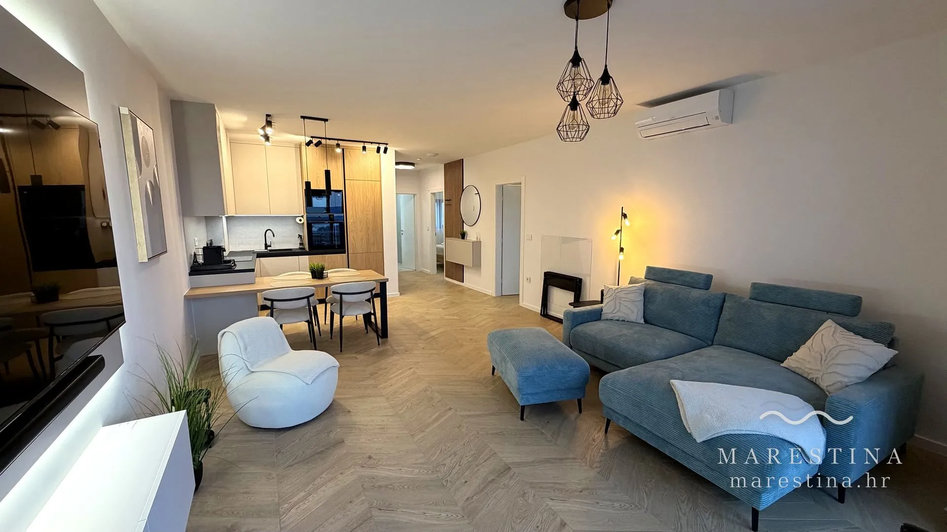 Open-plan living and dining area at Marestina